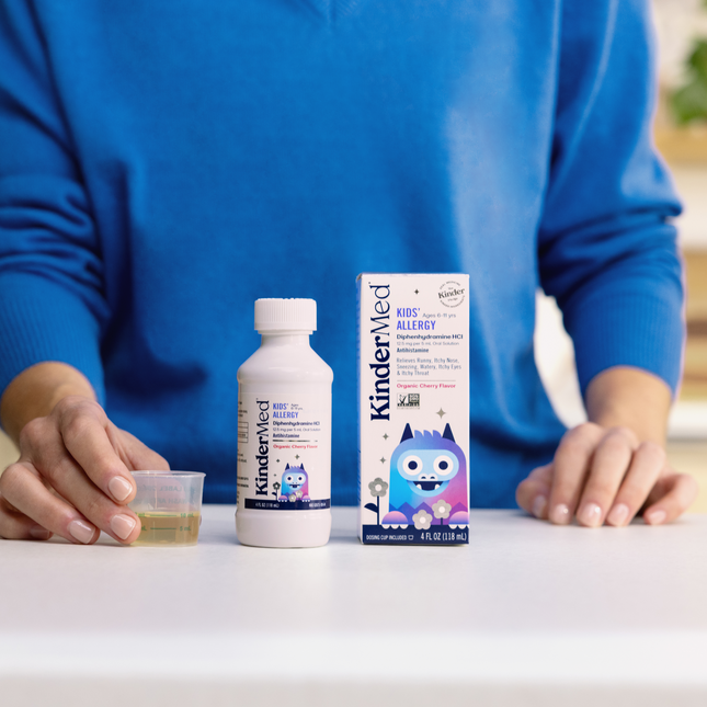 Product packaging and product bottle sitting on a clean countertop.